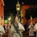 Black and white hooded Easter processions