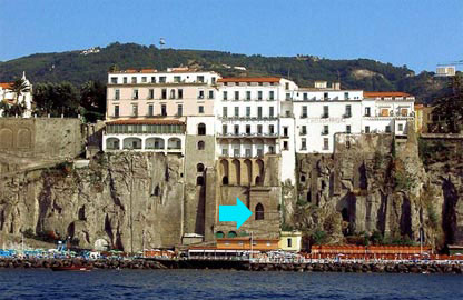 View of hotel from sea showing tunnel exit